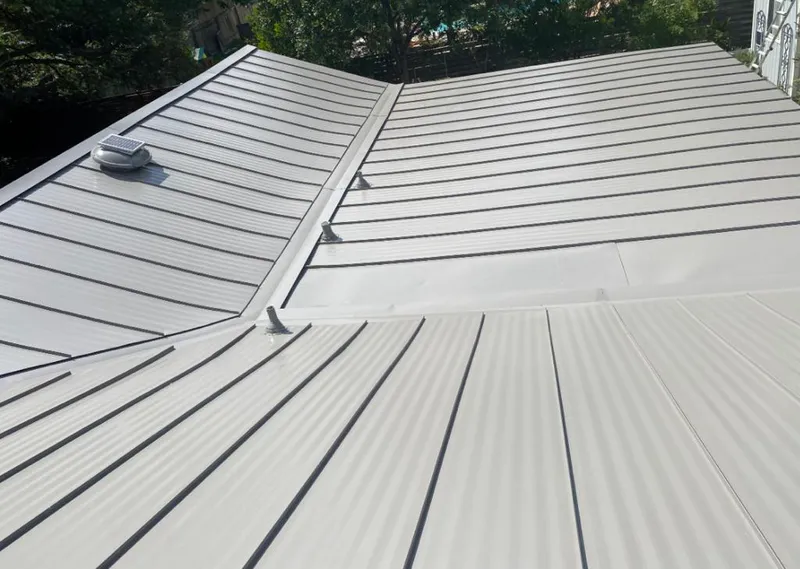 Solar attic fan installed on a metal roof for Roof Ventilation in Humboldt
